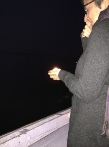 I got ready to put my dad's candle into the water.