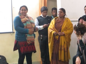 The woman on the right creates hand-painted silk shawls, from whom David bought many.