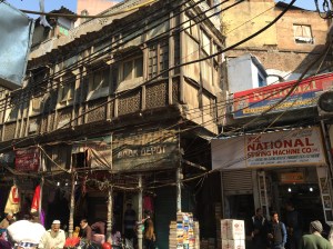 Beautiful old building. Sewing machine companies sell manual machines used everywhere. We saw only men sewing.