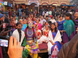 A group of costumed women and one man painted blue--not sure what they were doing.
