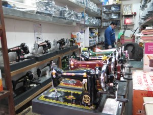 Shiny new manual sewing machines--the ones we saw at street tailors and in, for example, the place in Jaipur where I bought the Afghan antique fabric.