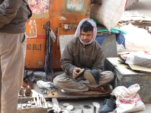 Shoe repairman on the sidewalk (common).